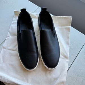 KOIO Black Slip-On Sneakers with Minimalist Design